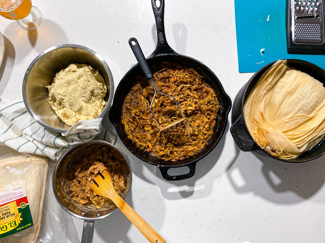 Overhead shot of three different recipe stages laid out on a kitchen counter ready for filming