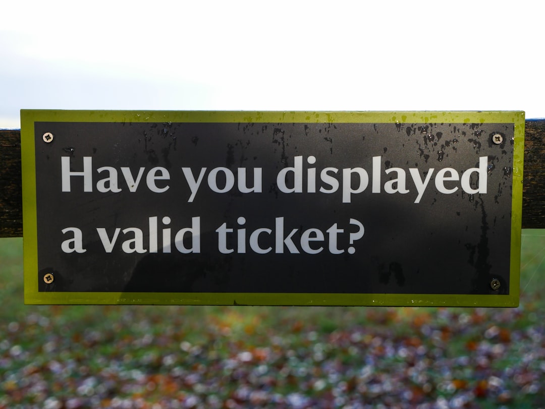 Close-up of event check-in table with branded materials and name badges